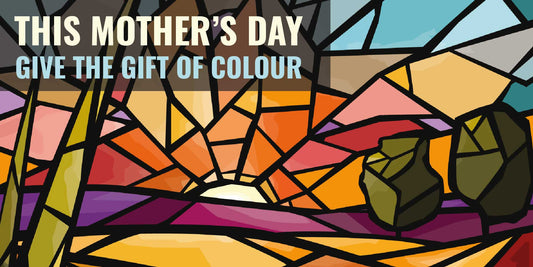 Stained glass effect illustration showing a sunsetting over a field. Text reads, this mother's day give the gift of colour. Full artwork is called Here Comes The Sun