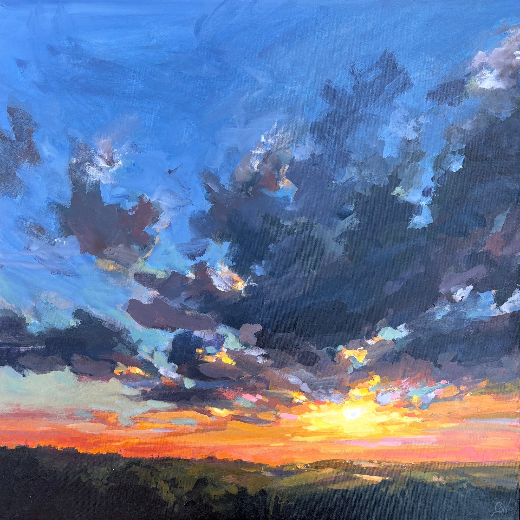 A framed landscape painting of a dramatic sunset sky with dark blue and purple clouds, a bright yellow sun near the horizon, and orange light over dark green hills..